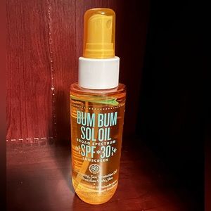 NWOB Sol de Janeiro Shimmering Oil SPF 30. Classic scent, bronze shimmer & SPF!